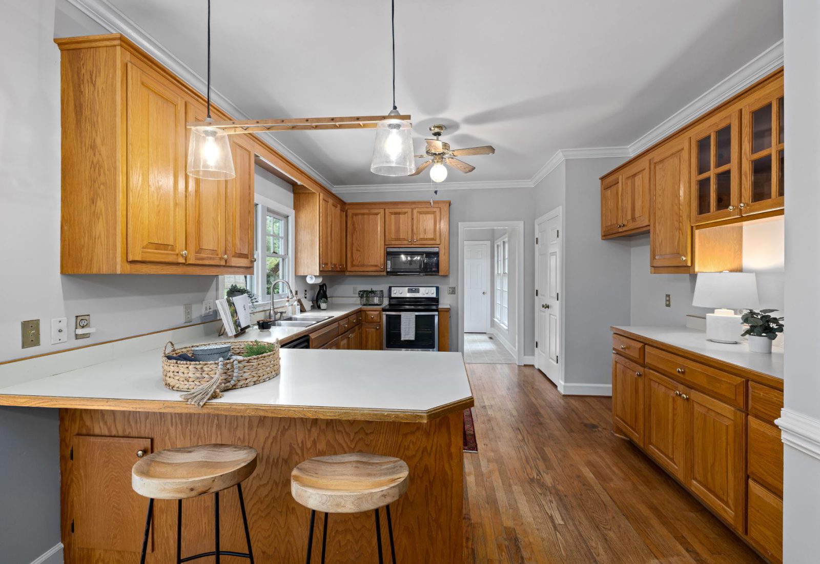 Dated kitchen with honey oak cabinet doors before replacement