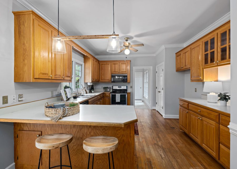Kitchen before the work: Honey Oak to White Shaker, East Vancouver