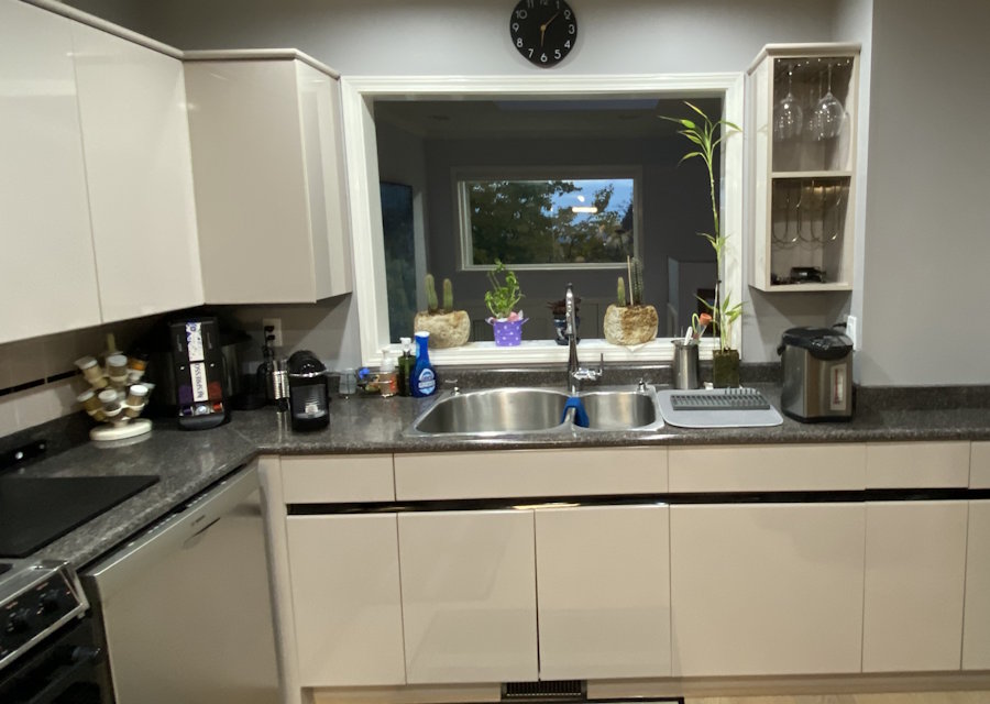Kitchen before the work: Dated grey to acrylic, North Burnaby