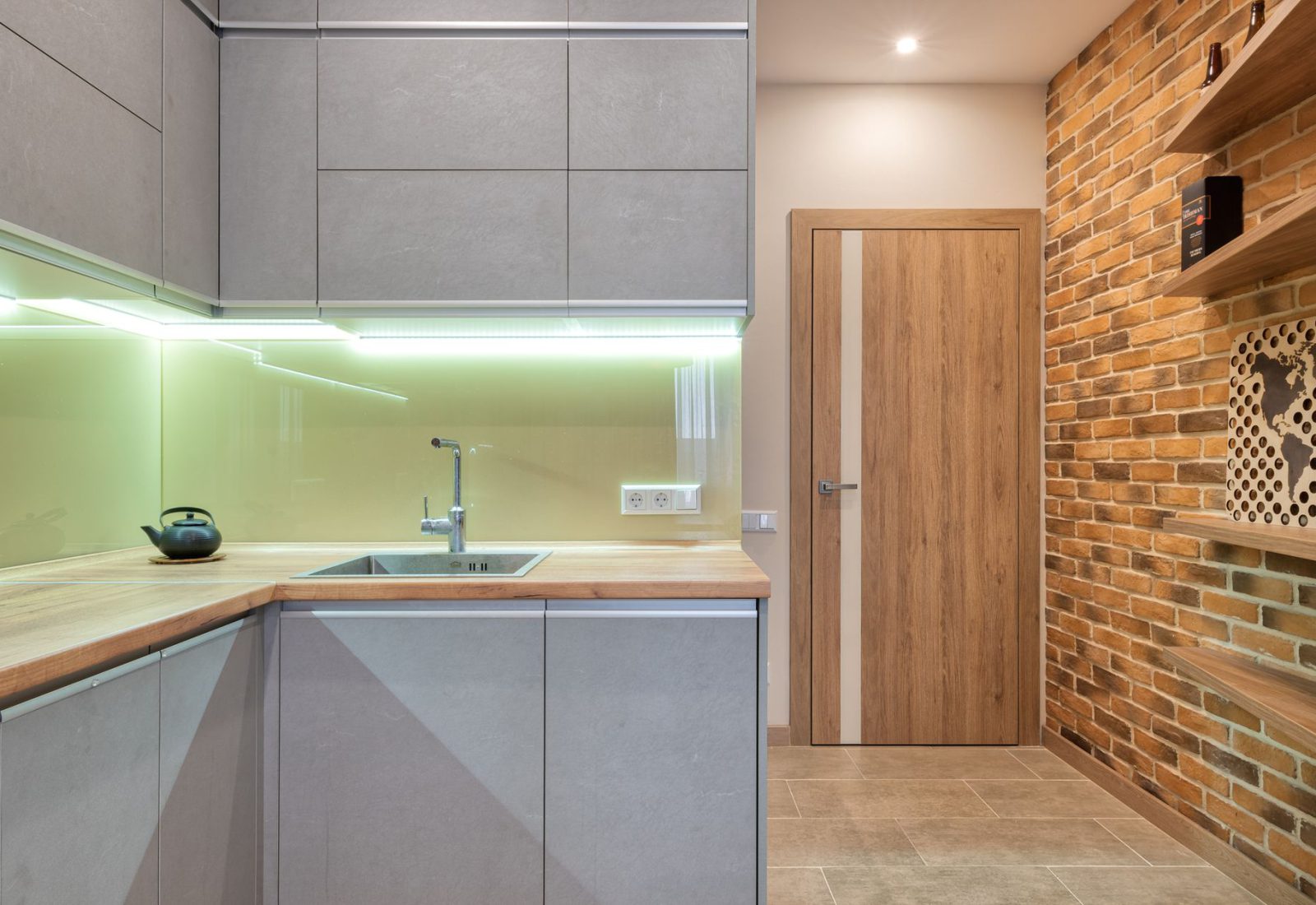 Close view of modern cabinet doors with under-cabinet lighting